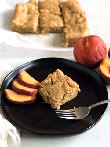 brown butter peach blondie on a plate