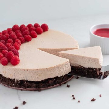 raspberry cheesecake with slice cut