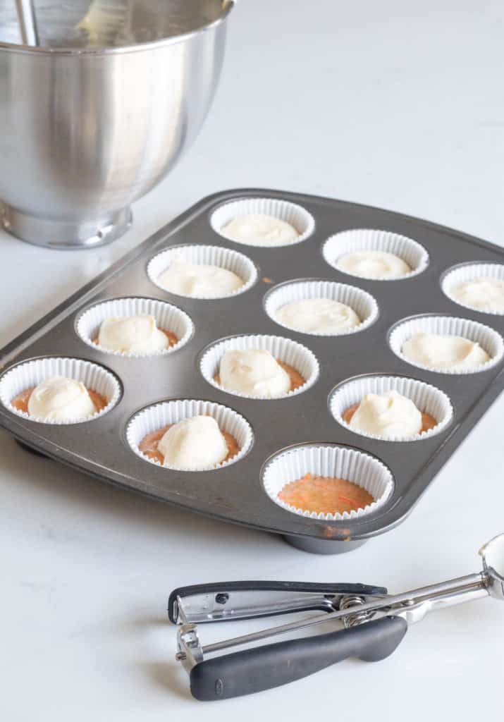 Carrot Cake Cheesecake batter in muffin tins