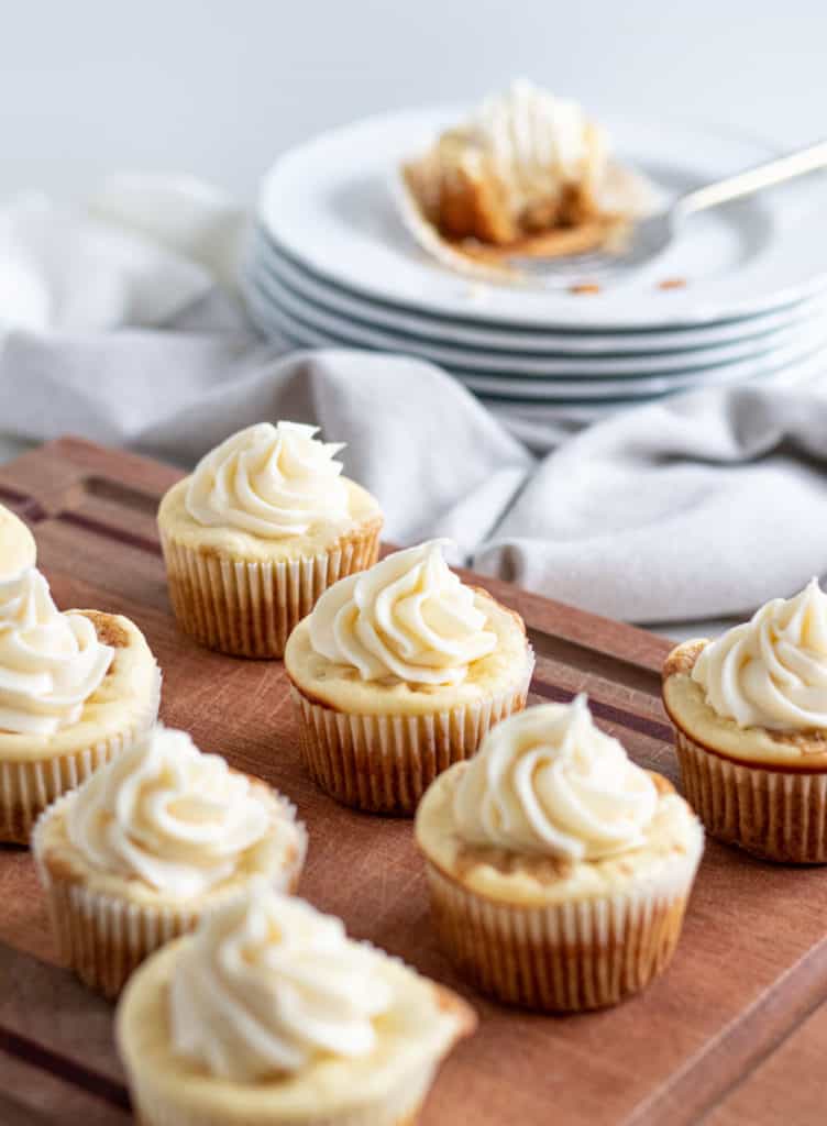 carrot cake cheesecake cupcakes on cutting board