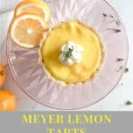 overhead view of lemon tart on plate and cake stand