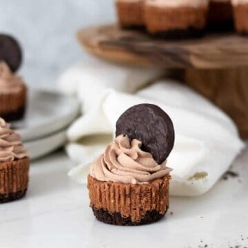 mini chocolate cheesecake with a cookie on top