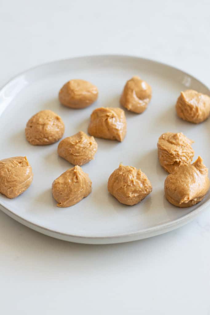 peanut butter in balls on plate