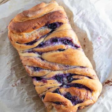 loaf of babka swirled with blueberries