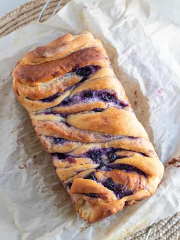 loaf of babka swirled with blueberries