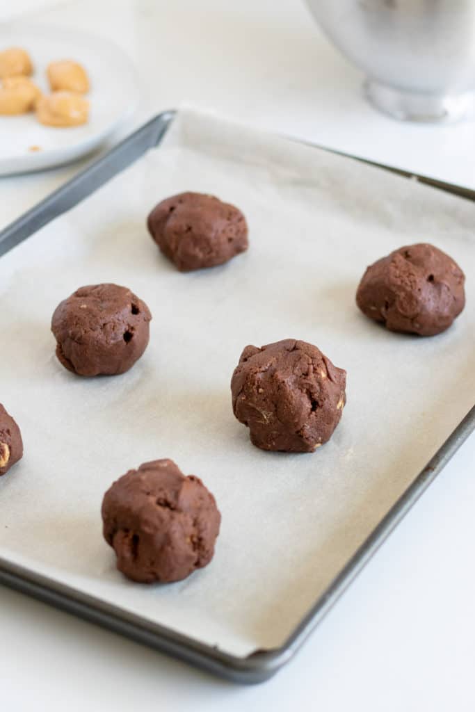 chocolate peanut butter cookie dough on baking tray