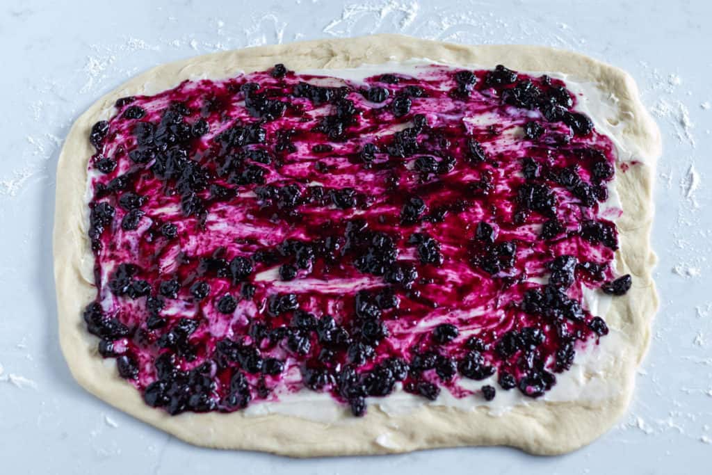 babka dough spread with blueberry preserves