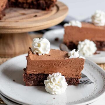 chocolate brownie mousse cake slice on plate