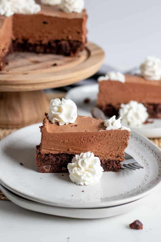 chocolate brownie mousse cake slice on plate