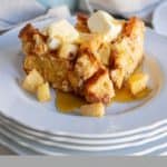 french toast casserole on stack of white plates