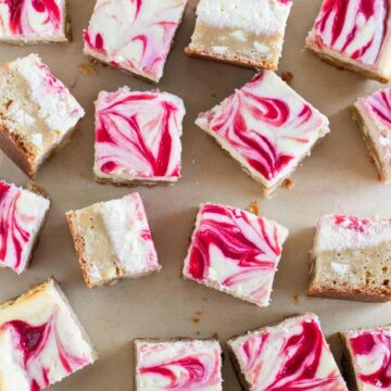 raspberry cheesecake bars cut into squares