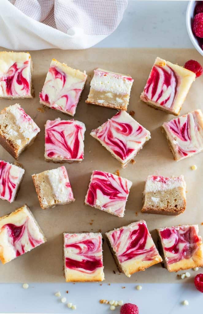raspberry cheesecake bars cut into squares