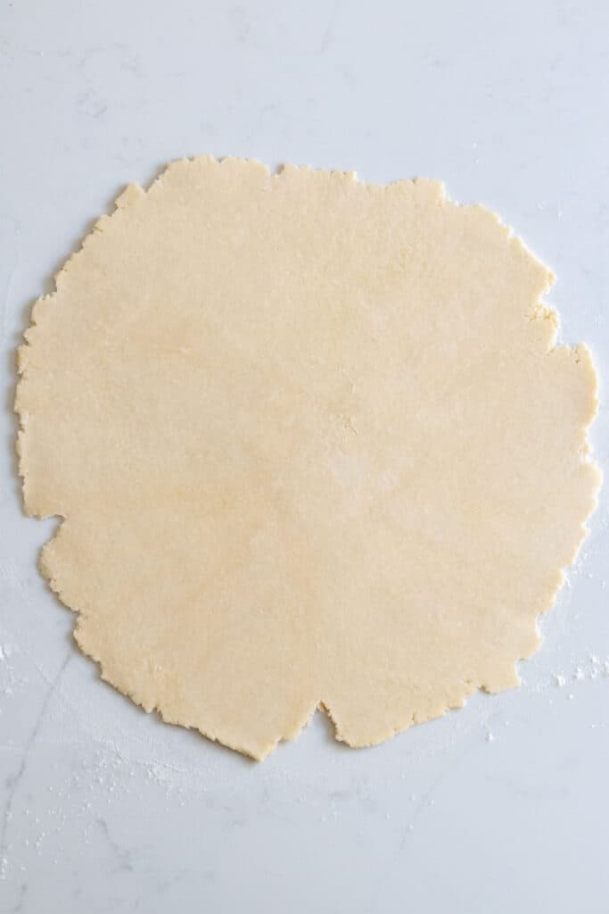 circle of pie dough on counter