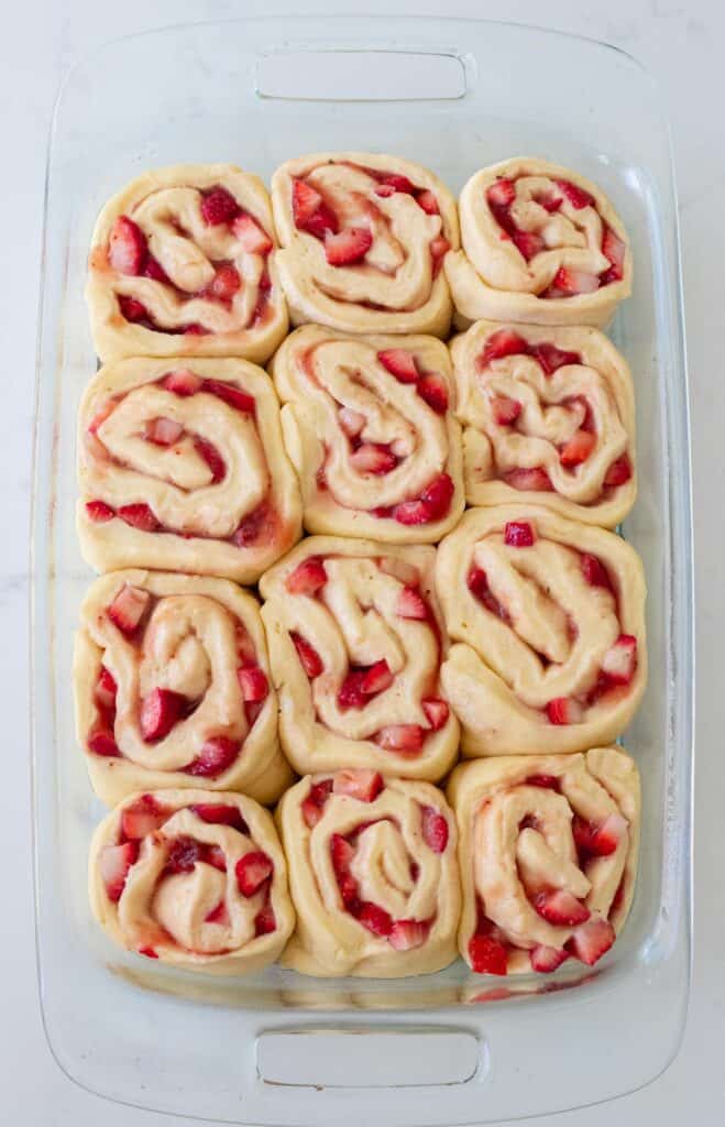 strawberry rolls unbaked in glass baking dish