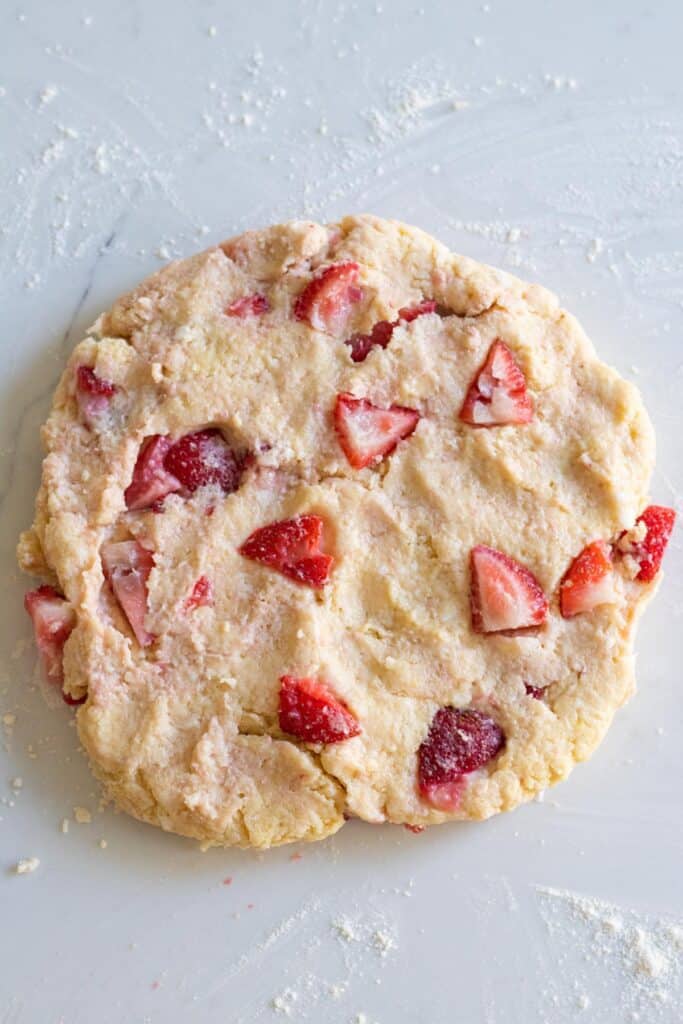 strawberry scone dough rolled into a circle