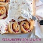 strawberry sweet rolls with frosting in pan