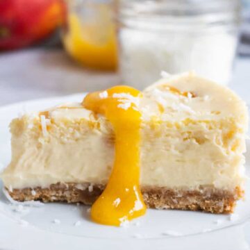 slice of mango cheesecake on plate