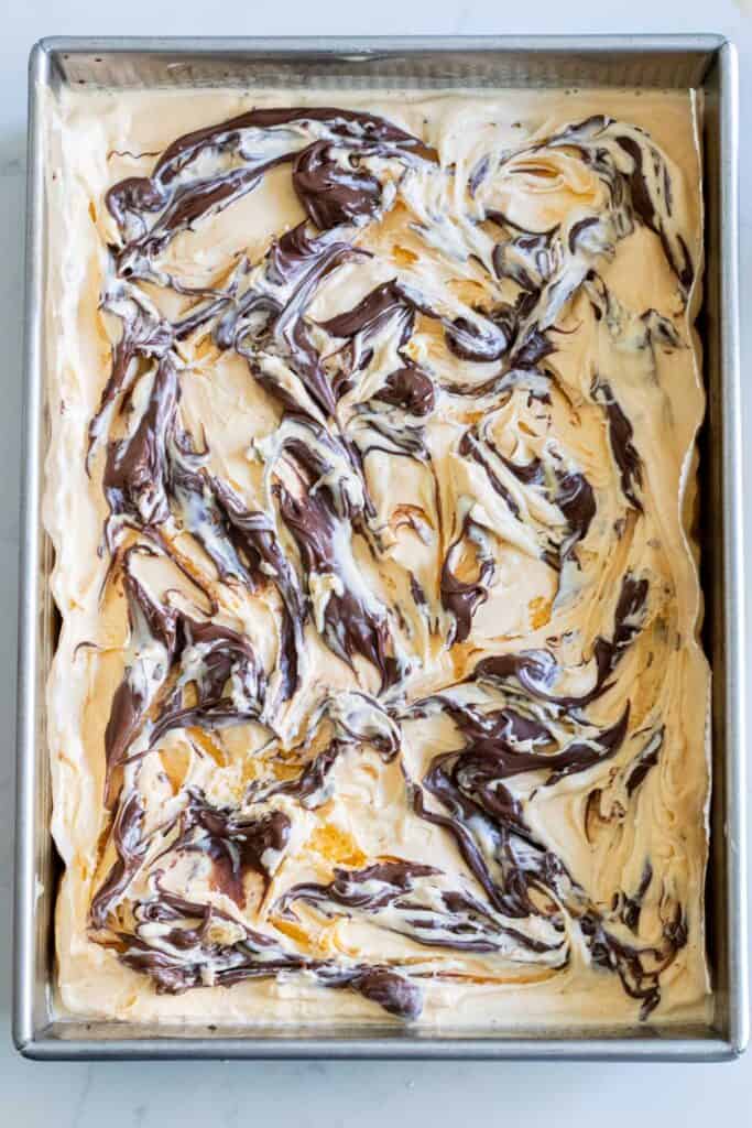 nutella swirled into vanilla ice cream