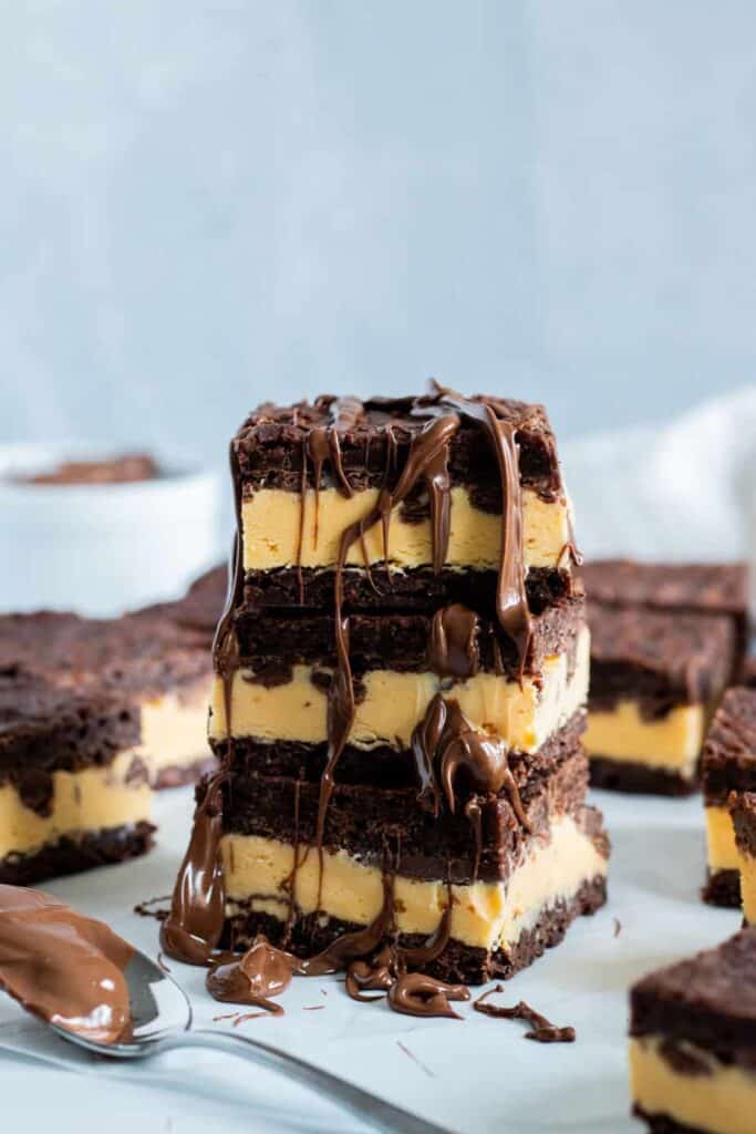 stack of brownie ice cream sandwiches with nutella drizzle