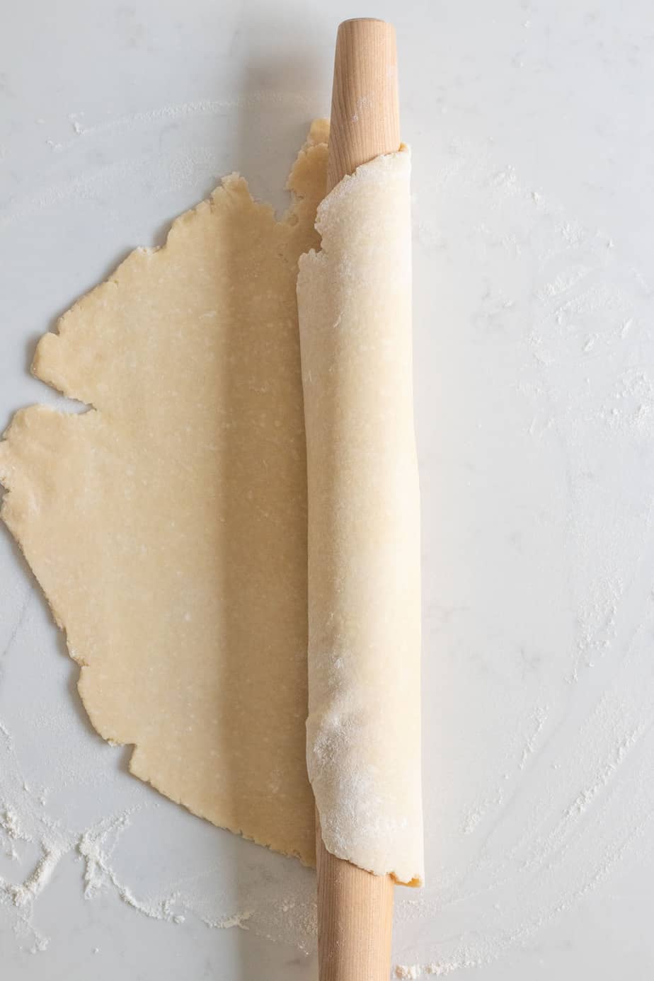 pie dough wrapped around rolling pin