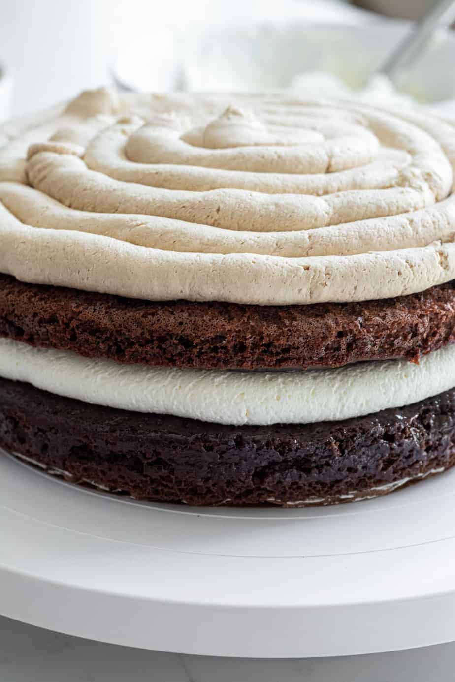 2 layers of chocolate cake with tiramisu filling and espresso cream filling