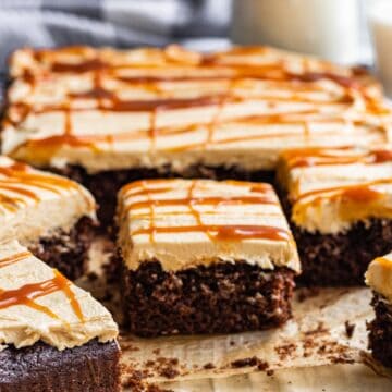 chocolate sheet cake with salted caramel frosting and salted caramel drizzled with milk in glass