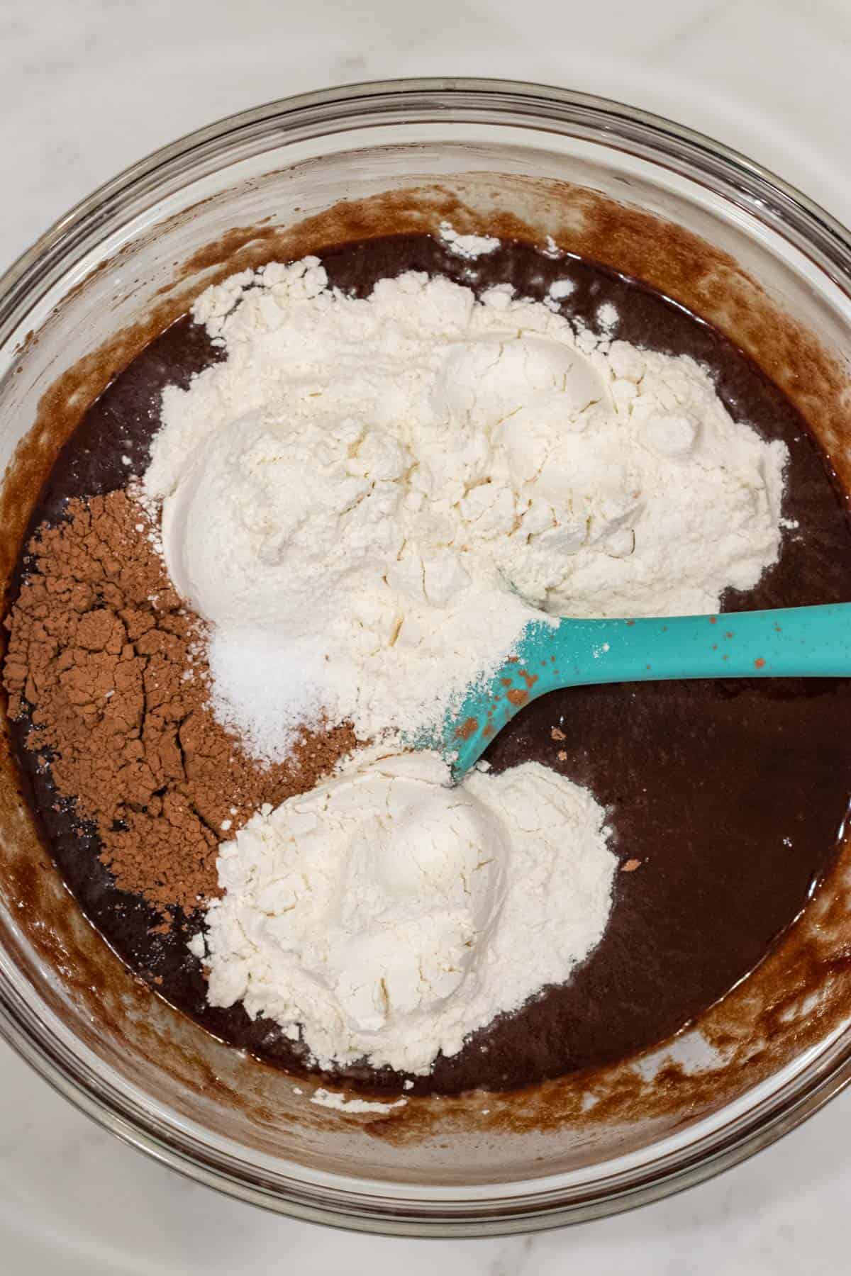 brownie ingredients in a glass mixing bowl