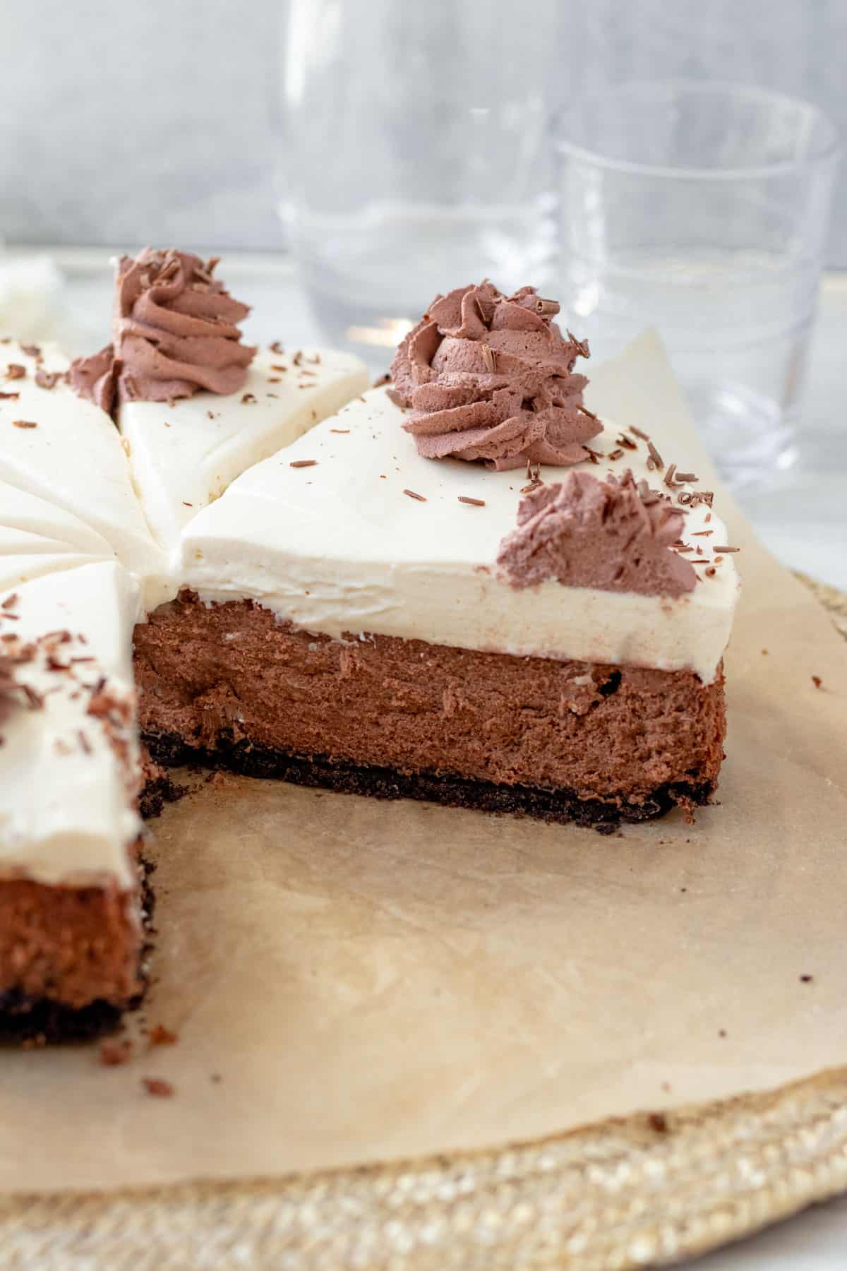 chocolate baileys cheesecake with layer of baileys mousse, sliced and looking at inside view