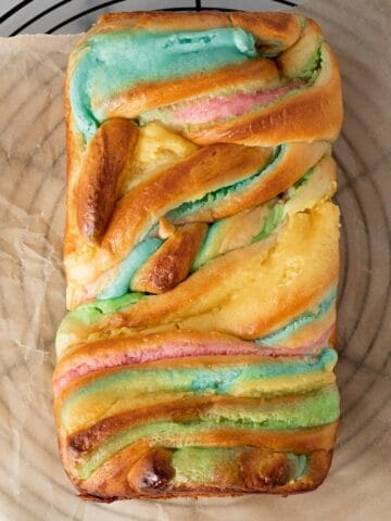 cream cheese babka with swirls of blue, pink, yellow and green cream cheese