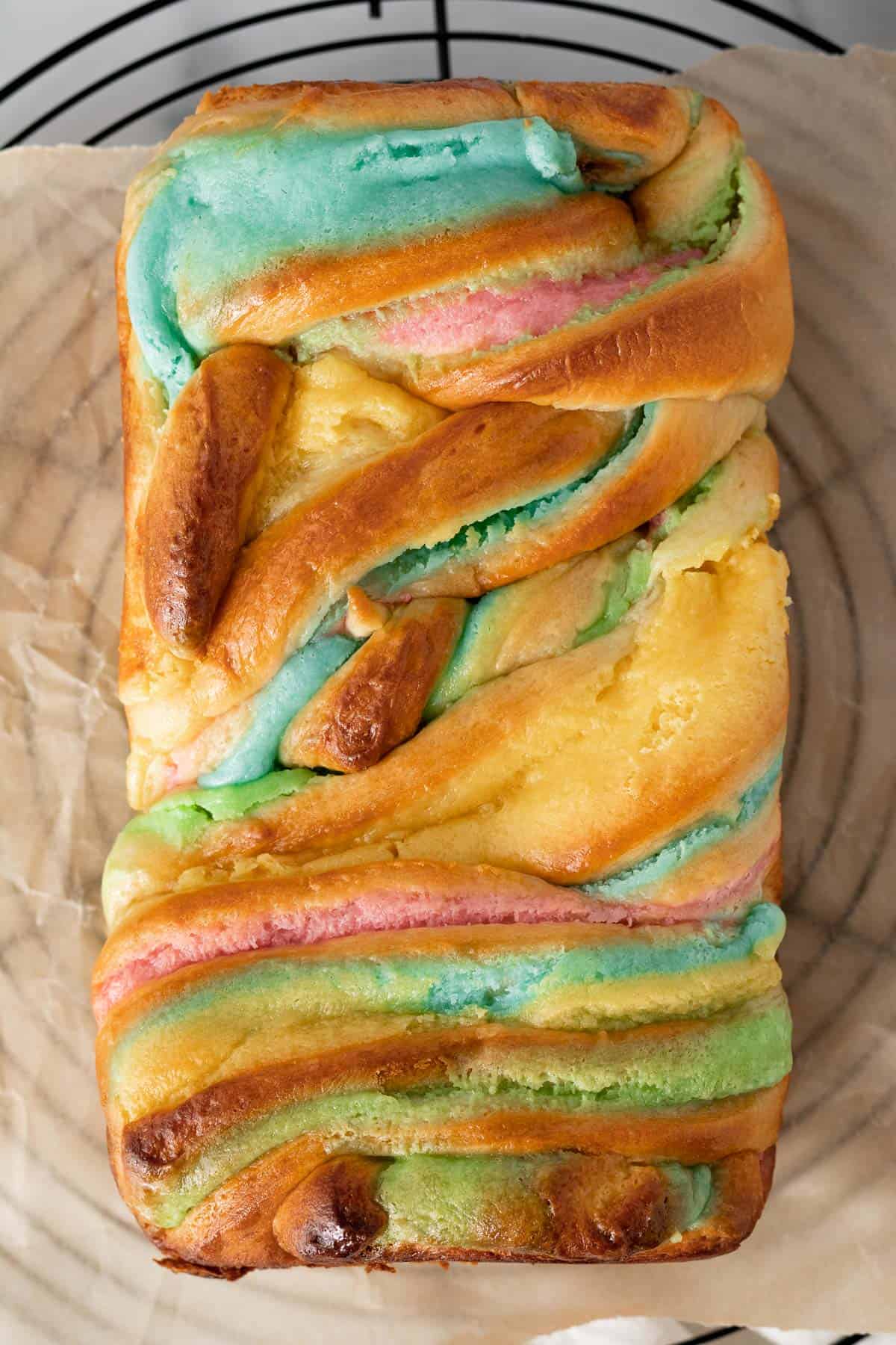 cream cheese babka with swirls of blue, pink, yellow and green cream cheese