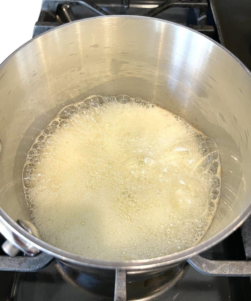 foamy melted butter in a saucepan