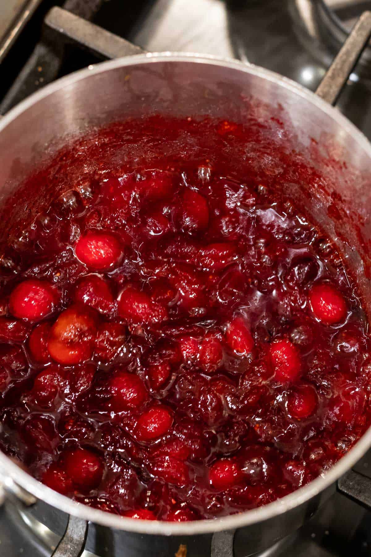 cranberry sauce in a silver saucepan