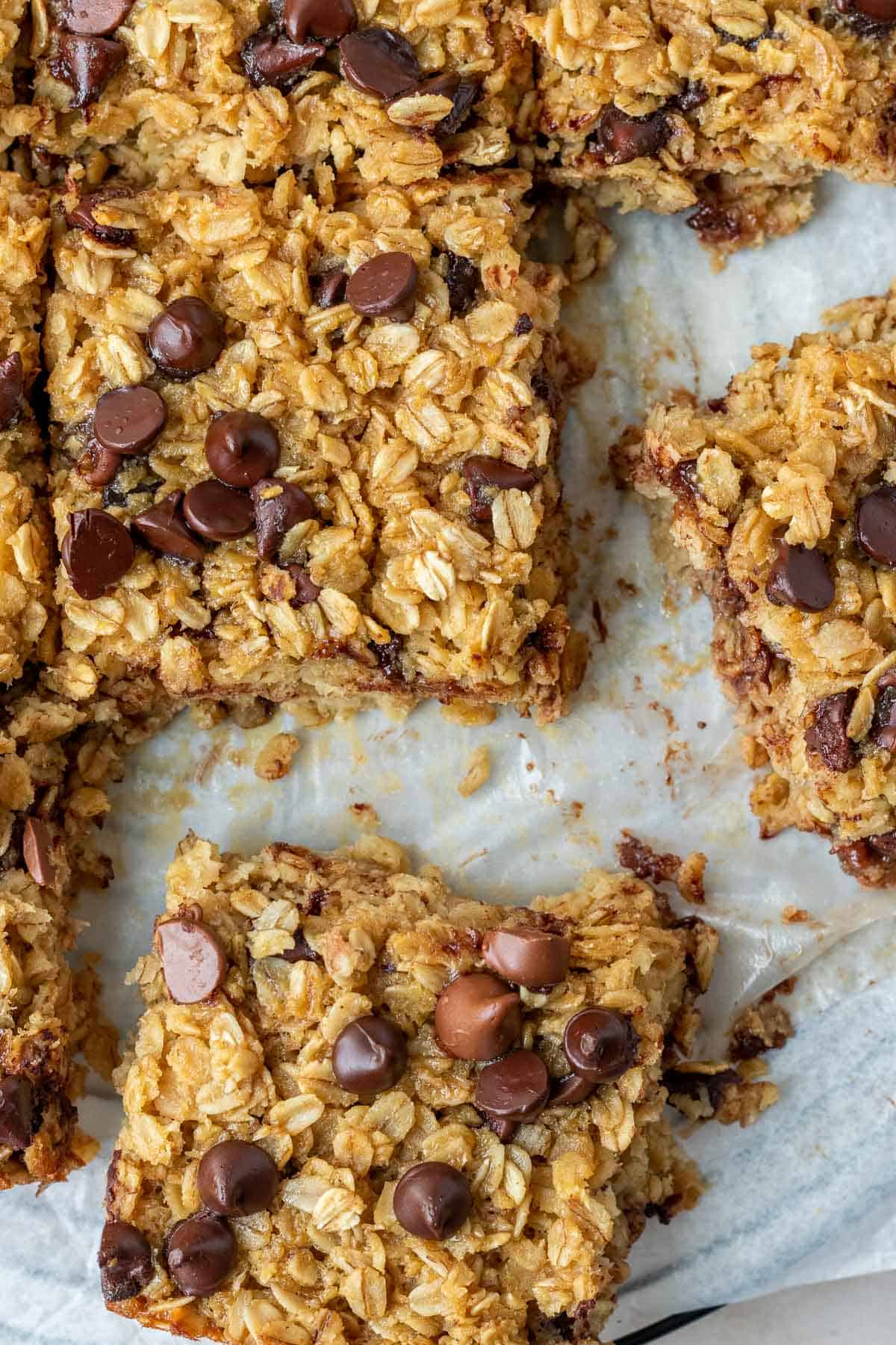 close up of slice chocolate chip baked oatmeal squares