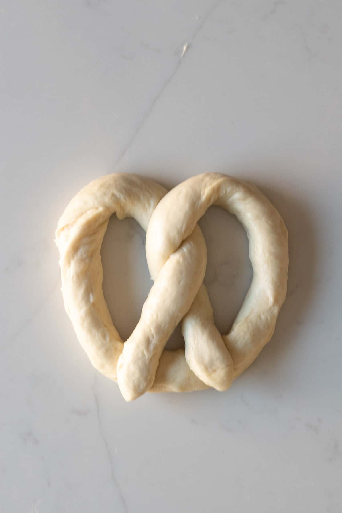 dough shaped into a pretzel