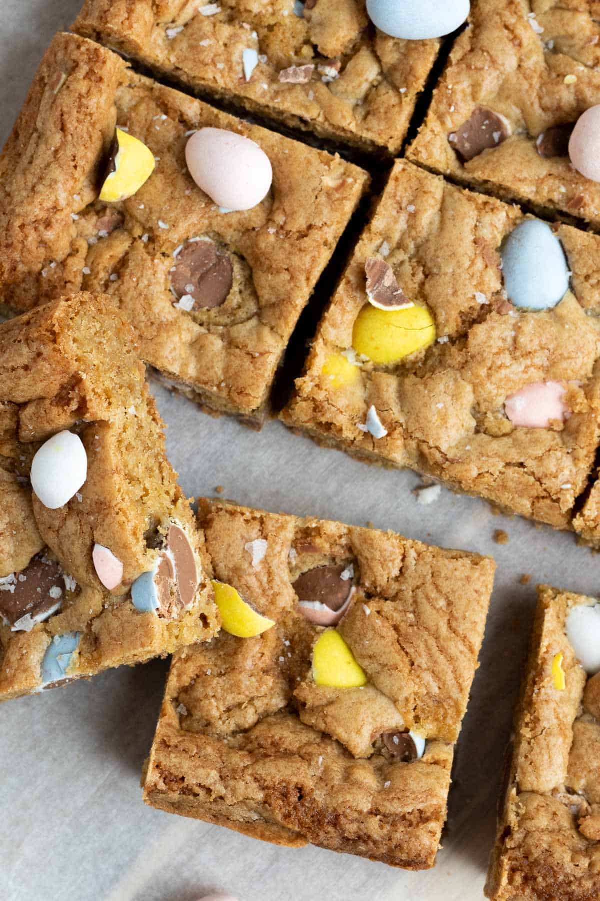 close up of mini egg cookie bars cut into squares 