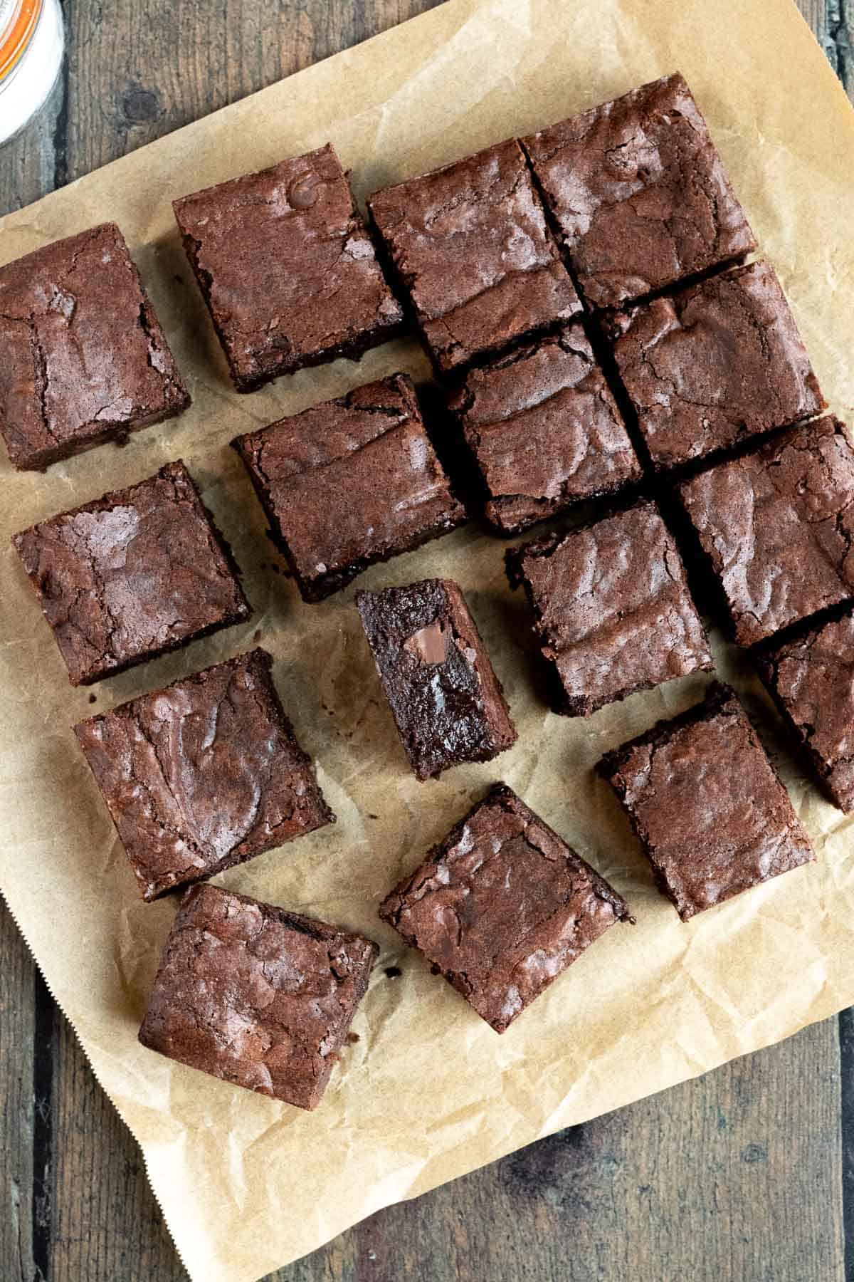 overhead view of dark chocolate brownies cut into squares